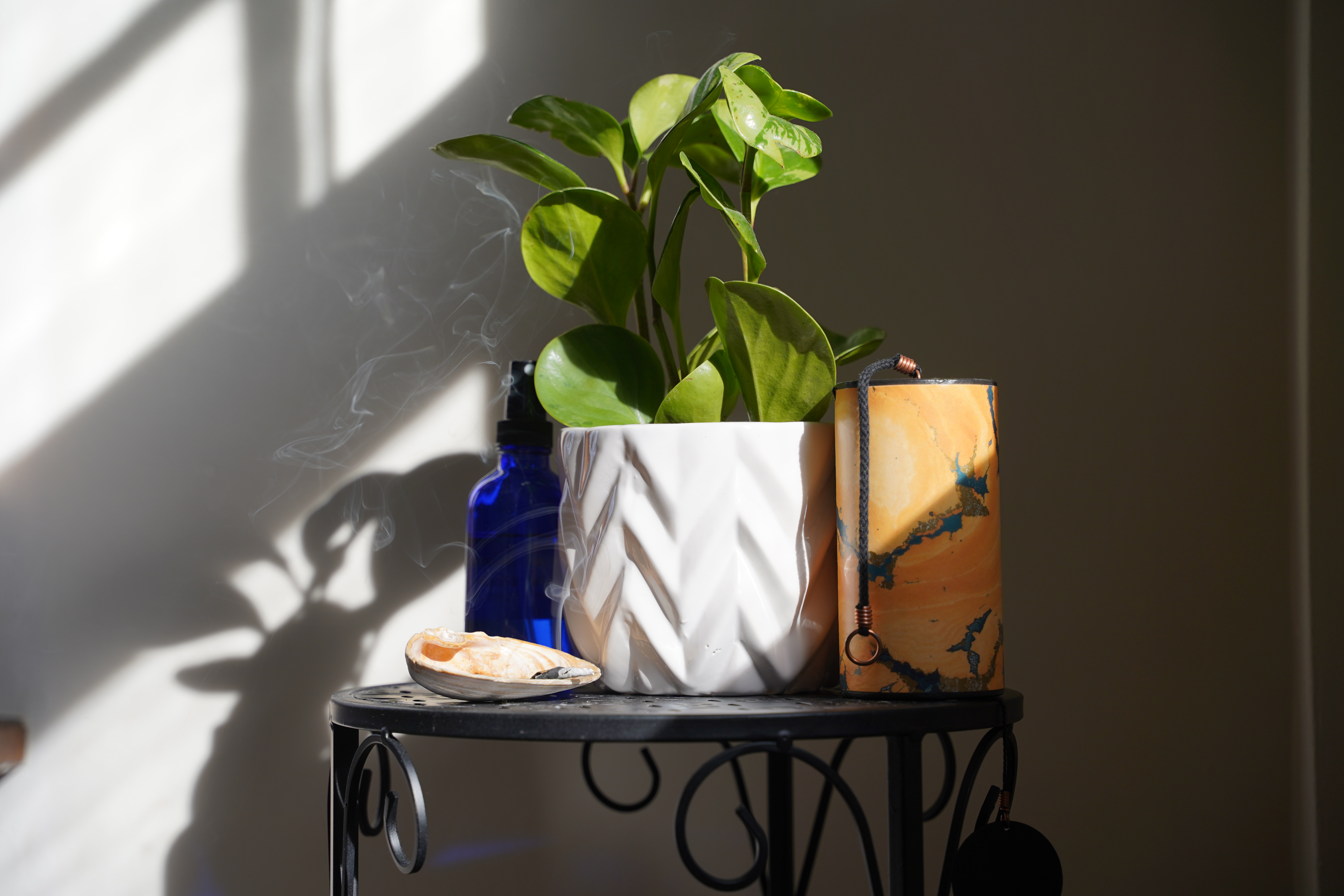 Grounded space with candle and plants