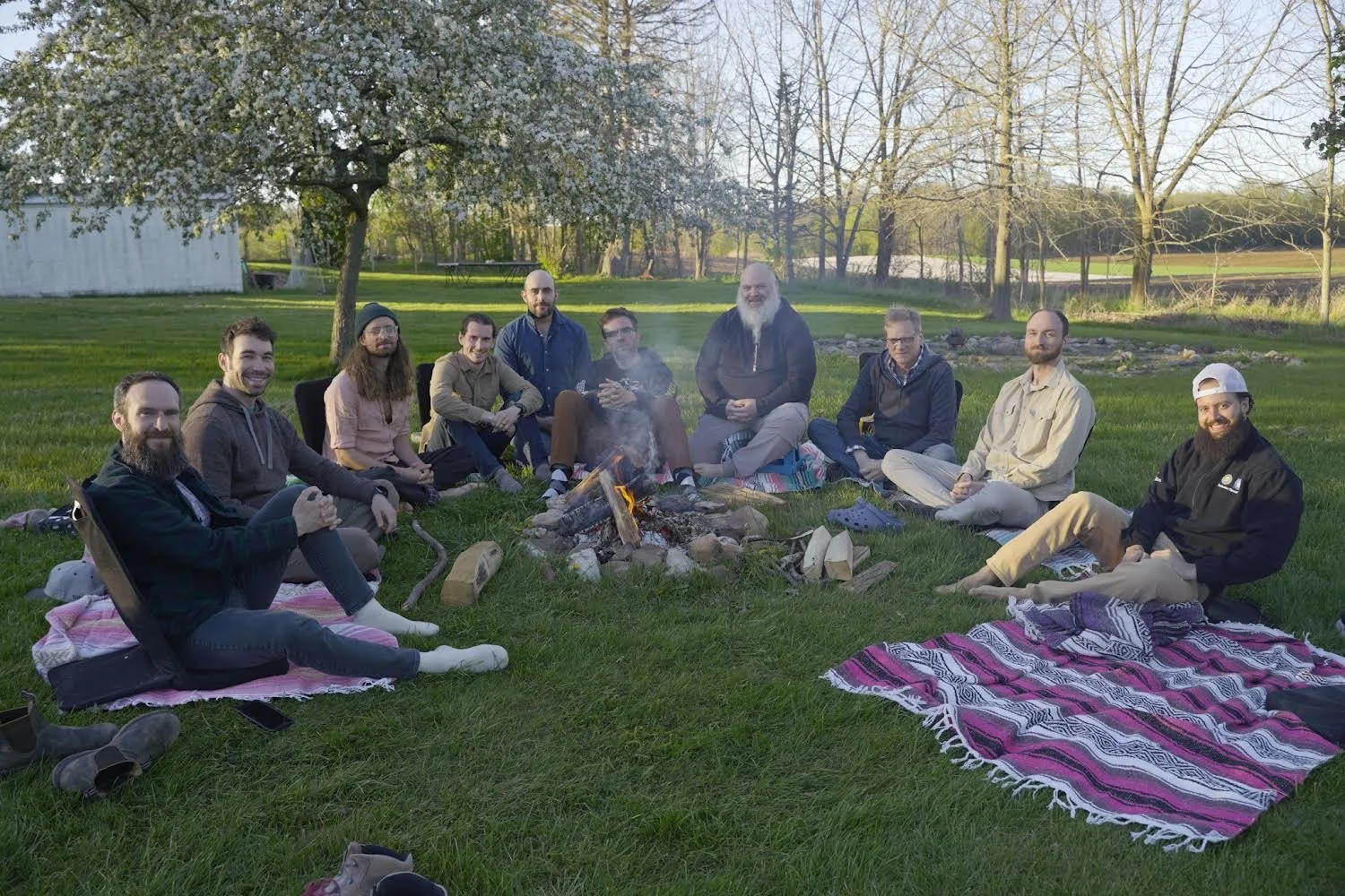 Men gathered around a campfire